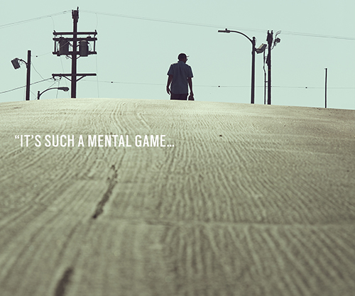 Frame one of a sequential Oakley digital ad campaign showing Eric Koston walking alone across an empty street with the quote ‘It’s such a mental game…’