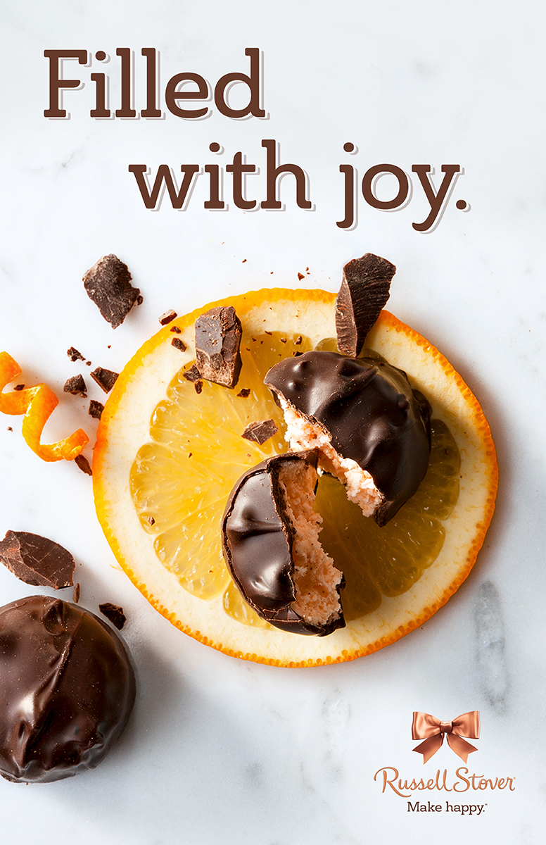 Russell Stover print advertisement showcasing the refreshed brand identity and packaging